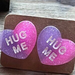 Hug me stud earrings pink and purple
